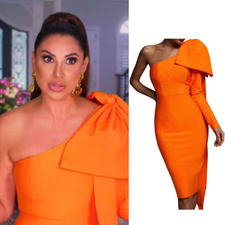 Jennifer Aydin’s Orange Bow Shoulder Confessional Dress