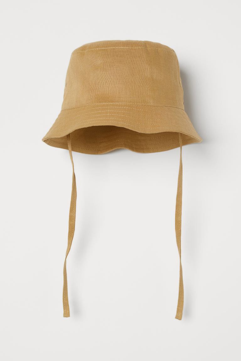 Baby Exclusive. Sun hat in soft, woven fabric. Ties under chin (not in sizes 0-4 months). Lined i... | H&M (US + CA)