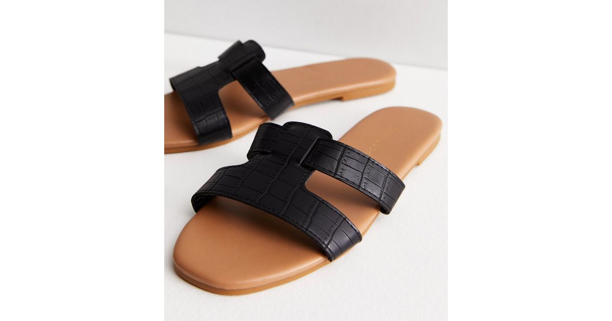 Black Faux Croc Sliders
						
						Add to Saved Items
						Remove from Saved Items | New Look (UK)