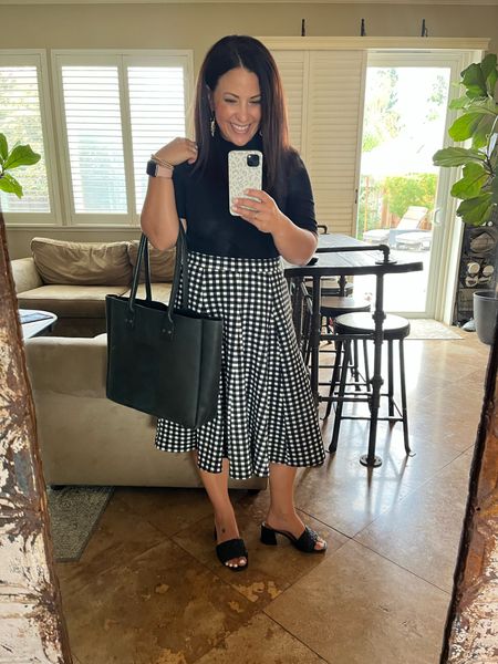 Black and white is also one of my favorite classic combos! My midi length plaid skirt is several years old, I’ve linked an updated version. Teacher outfits, fall workwear style

#LTKworkwear #LTKover40 #LTKBacktoSchool
