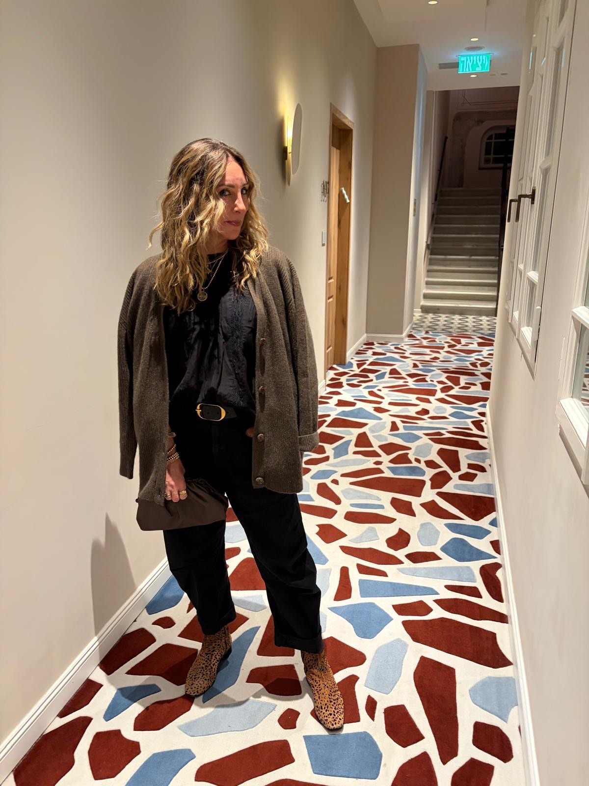 Our last night in Israel. The weather actually turned cool. The first week I was there it was summertime hot. Truly this brown cashmere sweater and little clutch have been major heroes in my wardrobe the past seven months.

#LTKgrwm #LTKootd #LTKdayinmylife