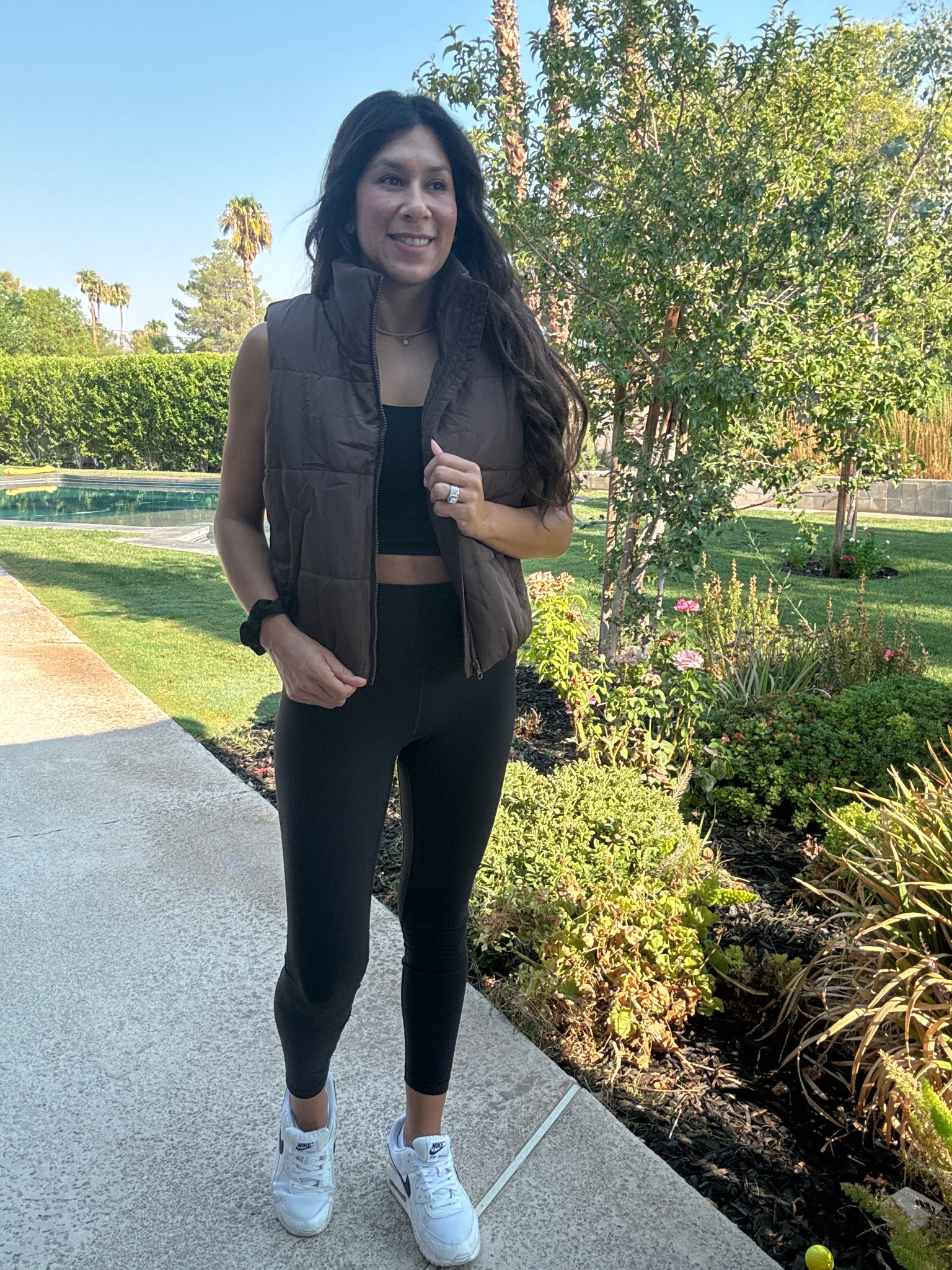 Keeping it sleek and trendy today. 🖤🟤  
Black leggings and a matching black top for that effortless vibe, topped off with this chic chocolate brown vest to elevate the look. 🤎 Paired it all with my fave white and black Nike Max kicks for that perfect sporty touch. Who else is loving this minimalist moment? #OOTD #SportyChic #MonochromeWithATwist #NikeMax #FitnessFashion 

#LTKFitness #LTKSeasonal #LTKActive