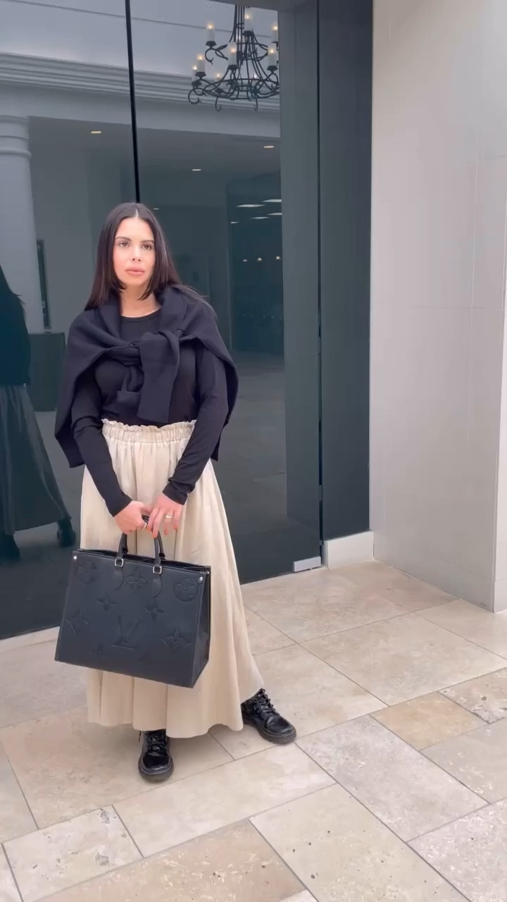 Style tip …. Our A line wide maxi skirt combined with a black basic shirt and black oversized sweater 

#LTKstyletip #LTKtravel #LTKworkwear