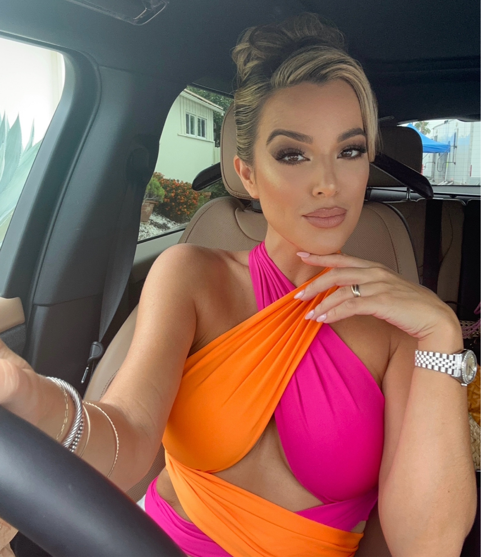 A must have for summer! I have it in three different colors. Such a comfortable piece and so fun and different! I paired it with these denim in a size 24 and nude staple heel 