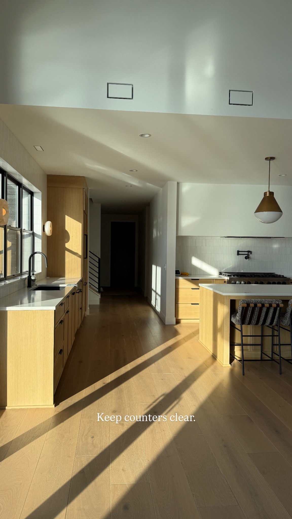 Keeping our counters clear and walls empty gives a sense of quiet luxury. Cabinets are rift white oak with a skinny shaker, stain is custom and saved in IG highlights, appliances are Zline, counters are quartz. 

#LTKHome