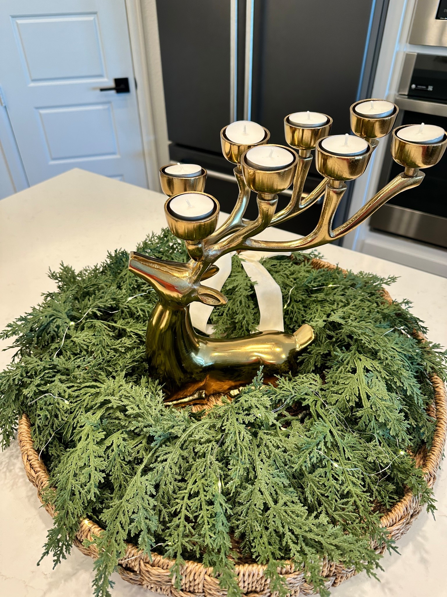 An easy holiday centerpiece is to start with a wreath and then add decor in the middle! 

#LTKHoliday #LTKStyleTip #LTKHome