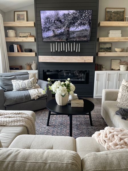 I just can’t get enough of these living room views 🤩

#livingroom #recliner #couch #rug #coffeetable #mantledecoe

#LTKFind #LTKhome #LTKstyletip
