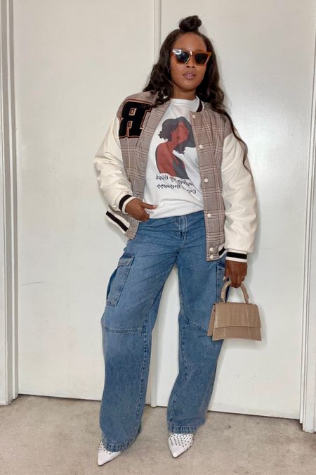 Letterman jacket with a graphic sweatshirt and cargo jeans! 


#LTKstyletip #LTKunder100