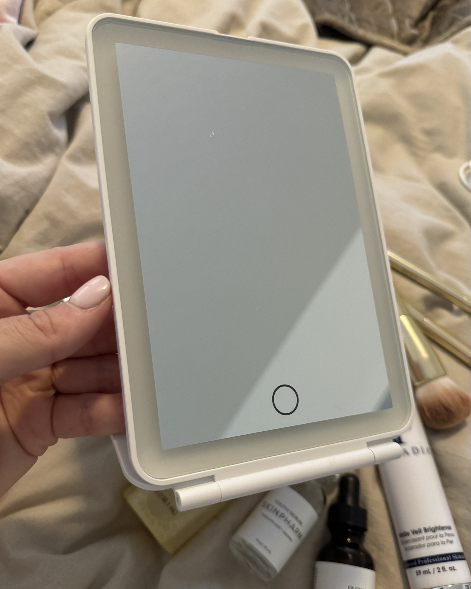 the best travel mirror that I often use for non-traveling… like makeup in bed 😄