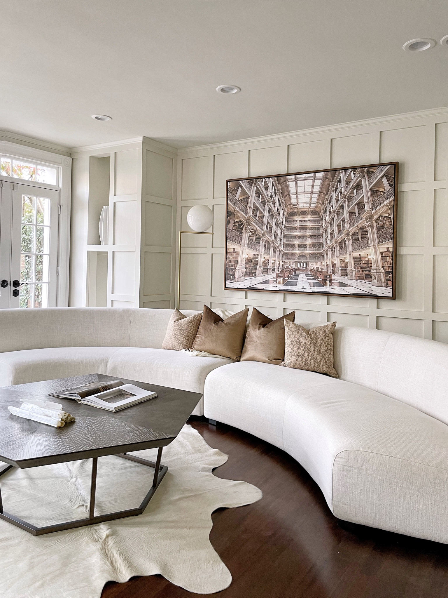 Indulge your senses in the cozy embrace of plush sofas adorned with soft cushions, providing the perfect balance of style and comfort. The blend of modern and bohemian aesthetics manifests in the mix of sleek, minimalist furniture and the organic warmth of natural materials like rattan, wicker, and wood! #ltkhomedecor #homedecor #luxurylivingroom #boholivingroom #livingroom

#LTKfamily #LTKhome #LTKstyletip