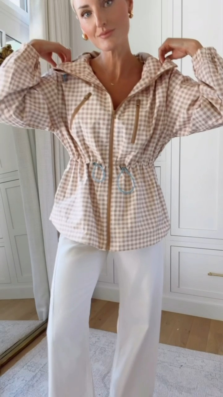 How cute is this gingham rain jacket?! I love the cinched in waist, and the pop of blue! A great windbreaker material that will keep you dry in the rainy weather. Wearing S/25! 

Loverly Grey, Amazon, gingham jacket, white jeans, fall outfit, fall jacket 

 #LTKootd #LTKSeasonal