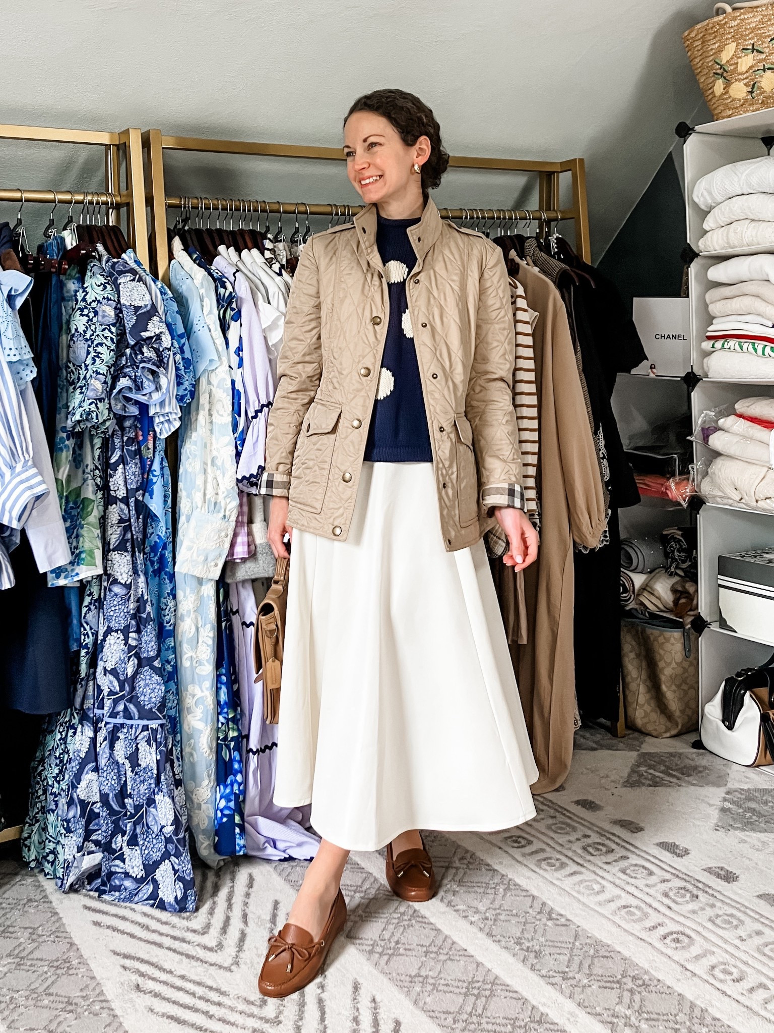 A neutral spring outfit!
Beige quilted Burberry jacket is old, linking similar. 
Navy and white polka dot sweater is old from J.Crew, linking similar. 
White skirt from @Chicwish 
Gold and white topaz earrings from Peachmind. 
Brown leather Coach handbag is vintage, linking similar. 
Nude knee high tights from Amazon. 
Brown leather loafers are old from Michael Kors, linking similar. 
Petite outfit. Modest outfit. Neutral outfit. Classic outfit  

#LTKootd #LTKgrwm #LTKdayinmylife