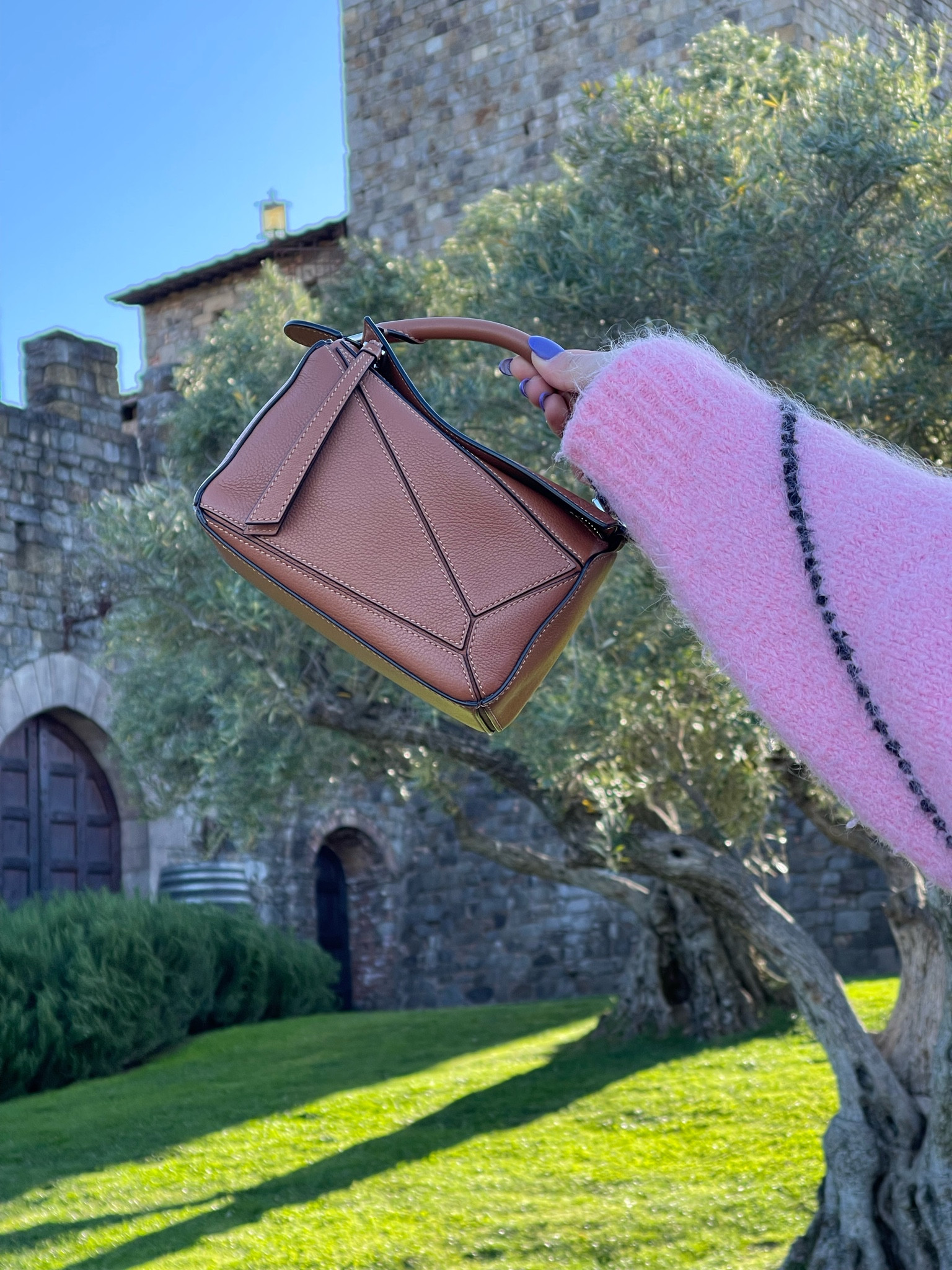 The cutest mini Loewe Puzzle bag. It comes with a crossbody strap, which makes it perfect to wear from day to night. 

#LTKitbag #LTKstyletip #LTKSeasonal
