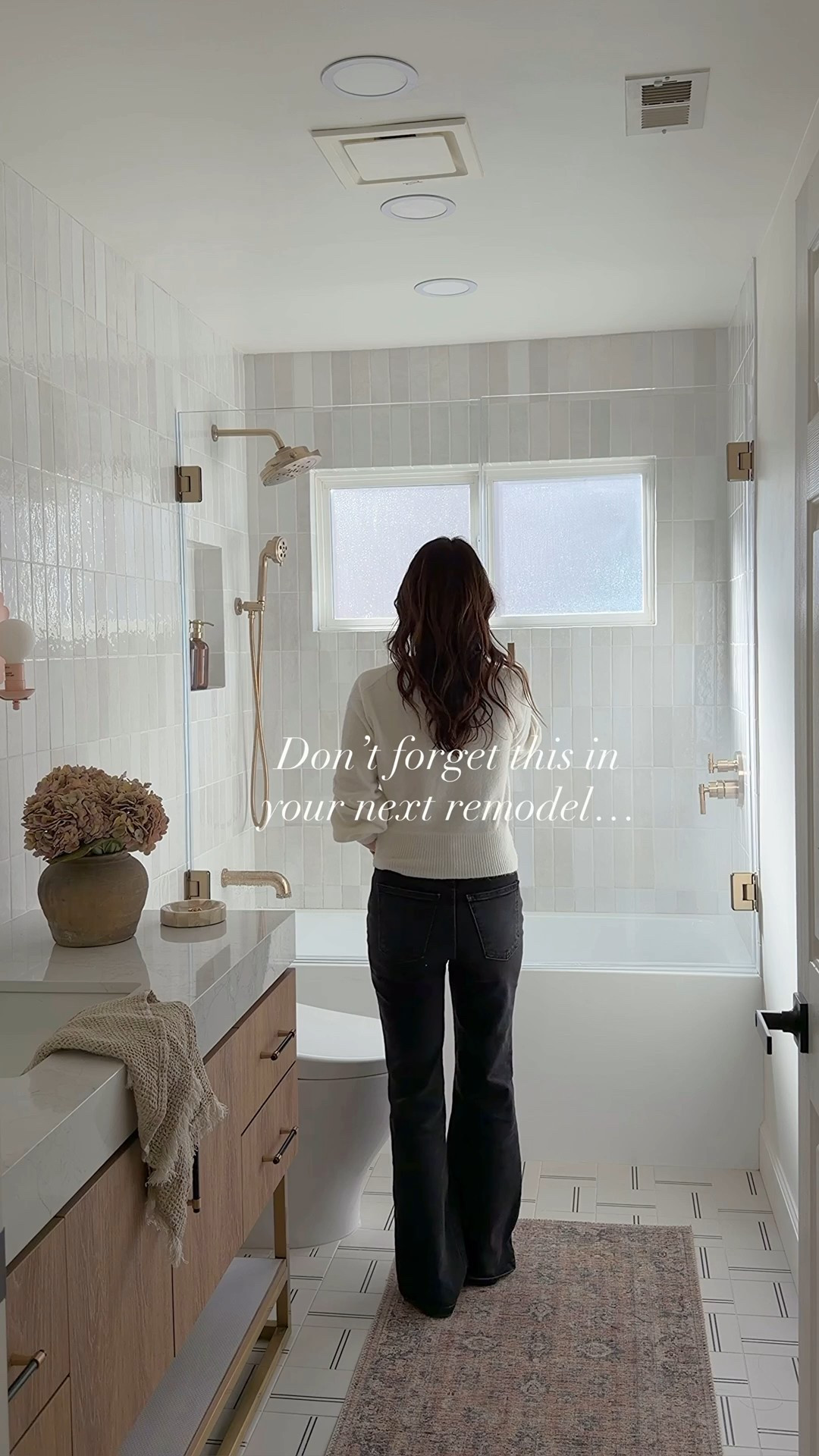 The one detail everyone forgets in their remodel! Avoid getting splashed by the water and put your controls on the opposite side of the showerhead. 

White tile, wood vanity, hydrangea, flowers, vase, Shower Glass door bathtub soaking brass, plumbing hardware faucet, shower bathroom design

#LTKFindsUnder100 #LTKSaleAlert #LTKHome