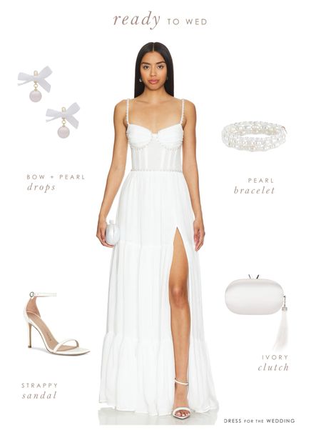 Loving corset dresses and Bridgerton style bustiers in dresses. No one does it quite like V Chapman. We’re hoping many brides to be will wear and love this white maxi dress with pearl studded corset bodice. Pearl earrings with a bow, white strappy heels and pearl bracelet with bridal clutch complete the look. Follow us for more romantic white dresses, engagement party dresses, welcome party dresses, bridal dresses shower dresses and Bachelorette dresses. Bachelorette star Hannah Ann was recently seen wearing this gorgeous dress ! 

#LTKParties #LTKWedding #LTKSeasonal