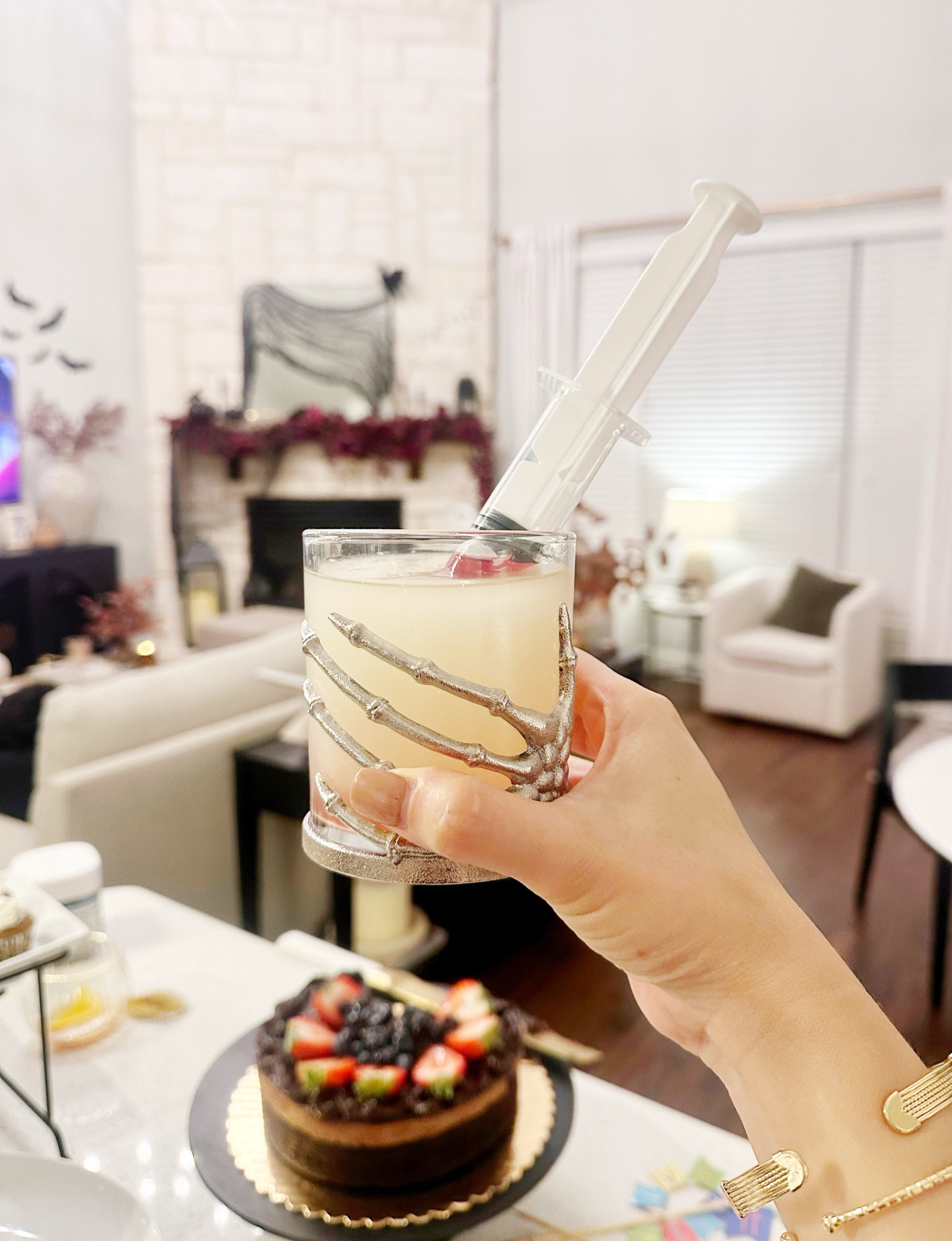 Frozen margarita with syringe sangria swirl for Halloween. Fun cocktail idea!

#LTKParties #LTKHalloween #LTKHome