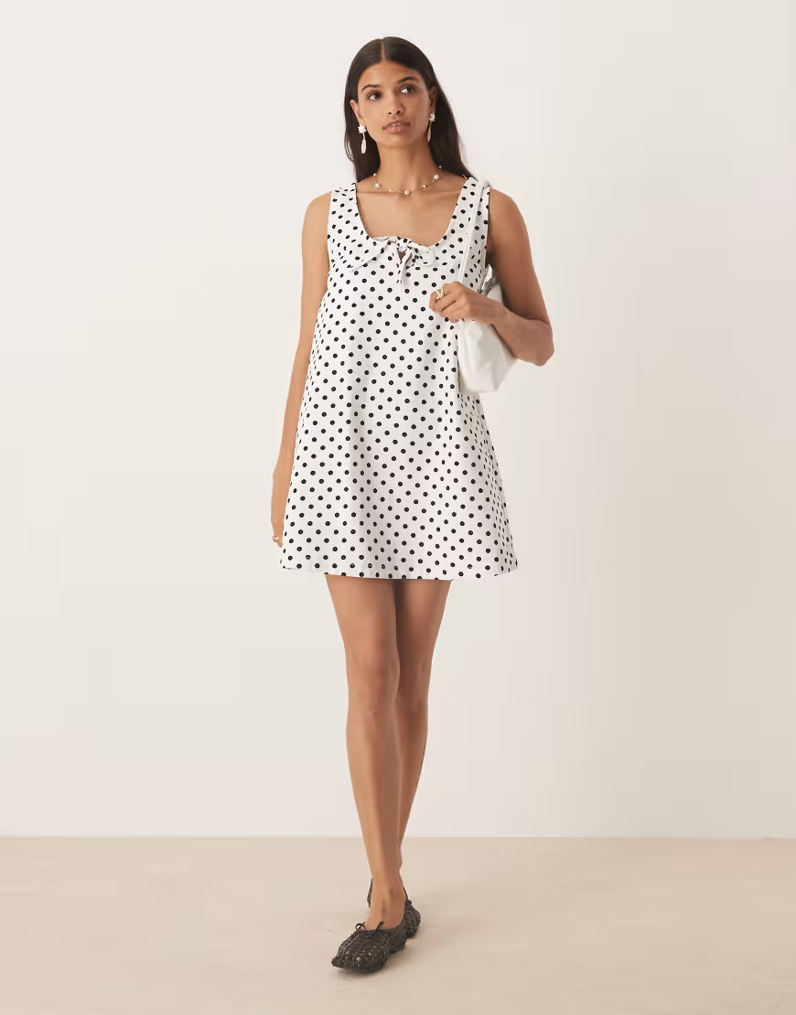 ASOS DESIGN denim scoop mini dress with bow front in polka dot-Multi | ASOS (Global)