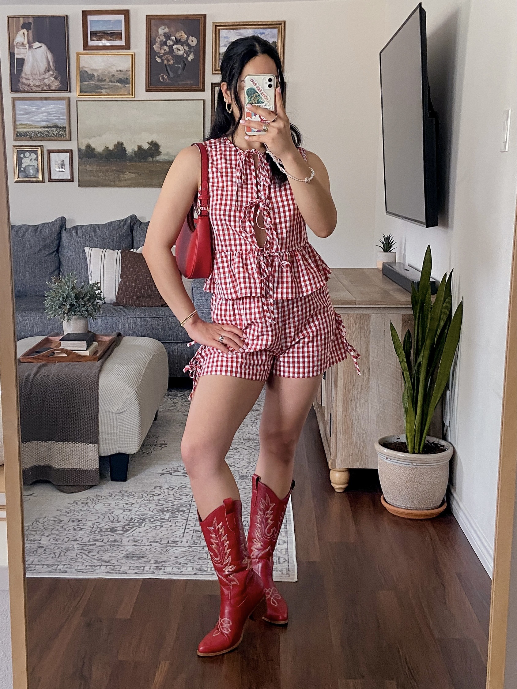 happy cinco de mayo!! the category for today’s ootd is: countryside picnic❣️🧺🤠 

i’m wearing this set in a size medium and it fits true to size. the tie details on both the top and bottom are so cute, also love the peplum ruffled hemline on the top. i kept this outfit monochromatic with matching red accessories for an overall casual look. 

🏷️: country concert outfit, summer outfit, gingham set, festival outfit, matching set, country boots, western boots, casual summer outfit

#LTKStyleTip #LTKSeasonal