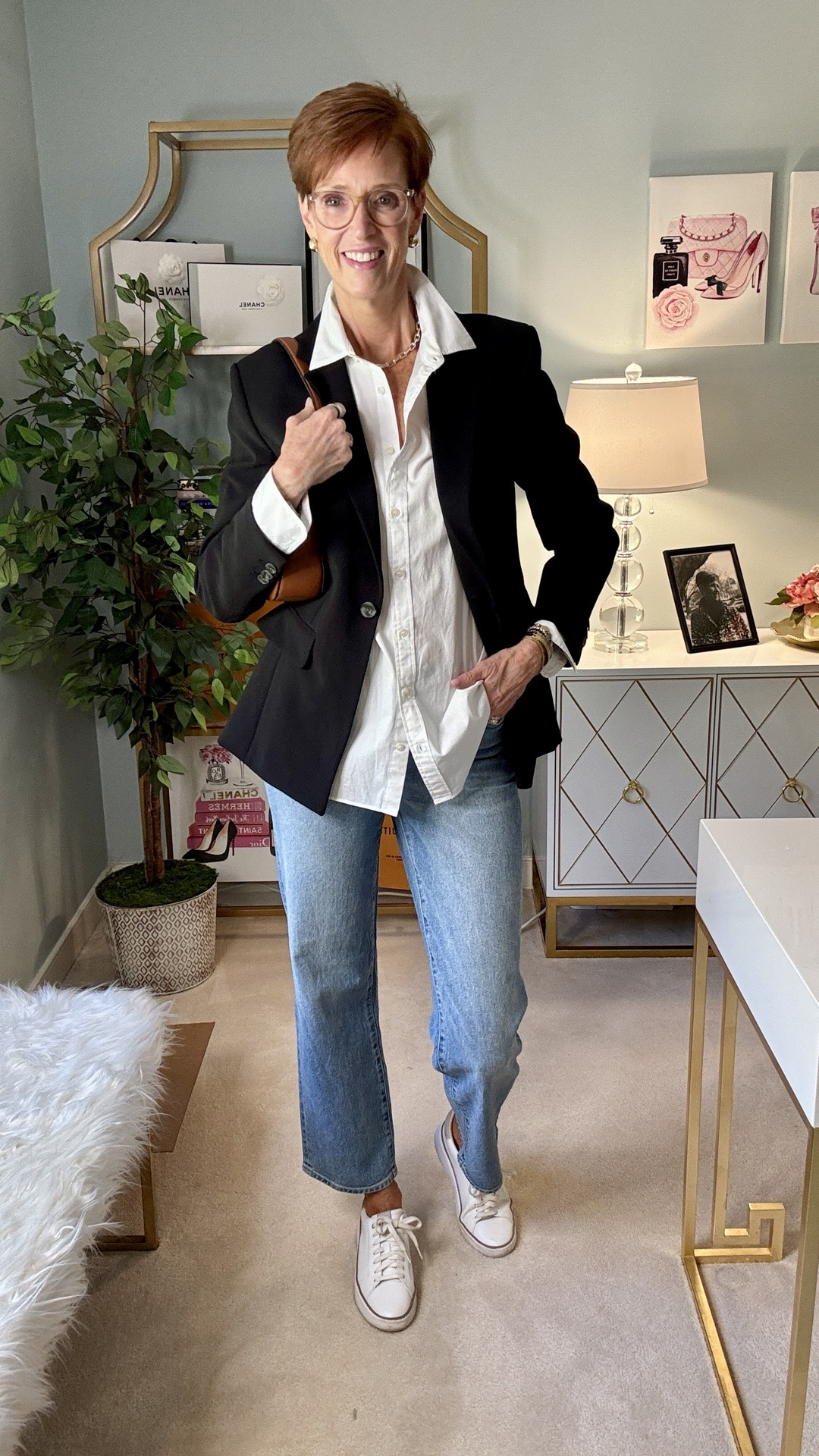 A white button-down and light-wash straight-leg jeans are already a classic combination. Add a black blazer and white leather sneakers, and suddenly the same basics feel much more polished without becoming dressy.

This is exactly why I keep reaching for a black blazer in the fall. And if this one looks familiar, it should. You saw it yesterday styled completely differently. The pieces that earn space in my closet are the ones I can actually wear more than one way.

Save this easy fall outfit formula for your next jeans day, and share it with a friend who loves classic everyday style.

Would you finish this outfit with sneakers, loafers or heels?

#FallOutfitIdeas #BlazerOutfits #StyleOver40 #ClassicStyle

#LTKootd #LTKOver40 #LTKTall