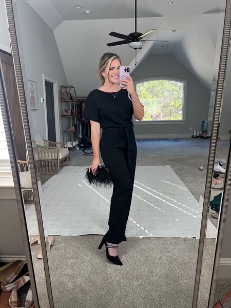 This jumpsuit is 🔥 sooo flattering. I feel so confident in it. Belt loop with tie waist belt - could change out for your own too! TTS - M 
Rehearsal dinner, bachelorette party weekend, girls night out, date night jumper jumpsuit, work party. Little black dress  

#LTKunder50 #LTKwedding #LTKSeasonal