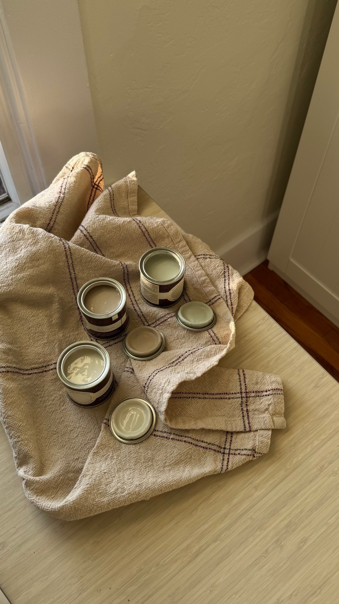 Can’t link the paint colors, but they’re all from Farrow & Ball! 

Here are the shades I’ve purchased to test out:
#300 stirabout 
#4 old white 
#2003 pointing 
#291 schoolhouse white
#18 French white