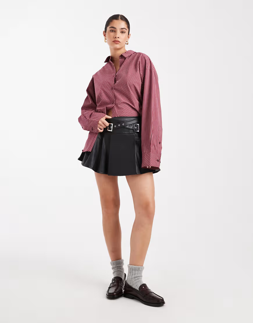 Miss Selfridge faux leather pleated kilt with buckle in black | ASOS (Global)