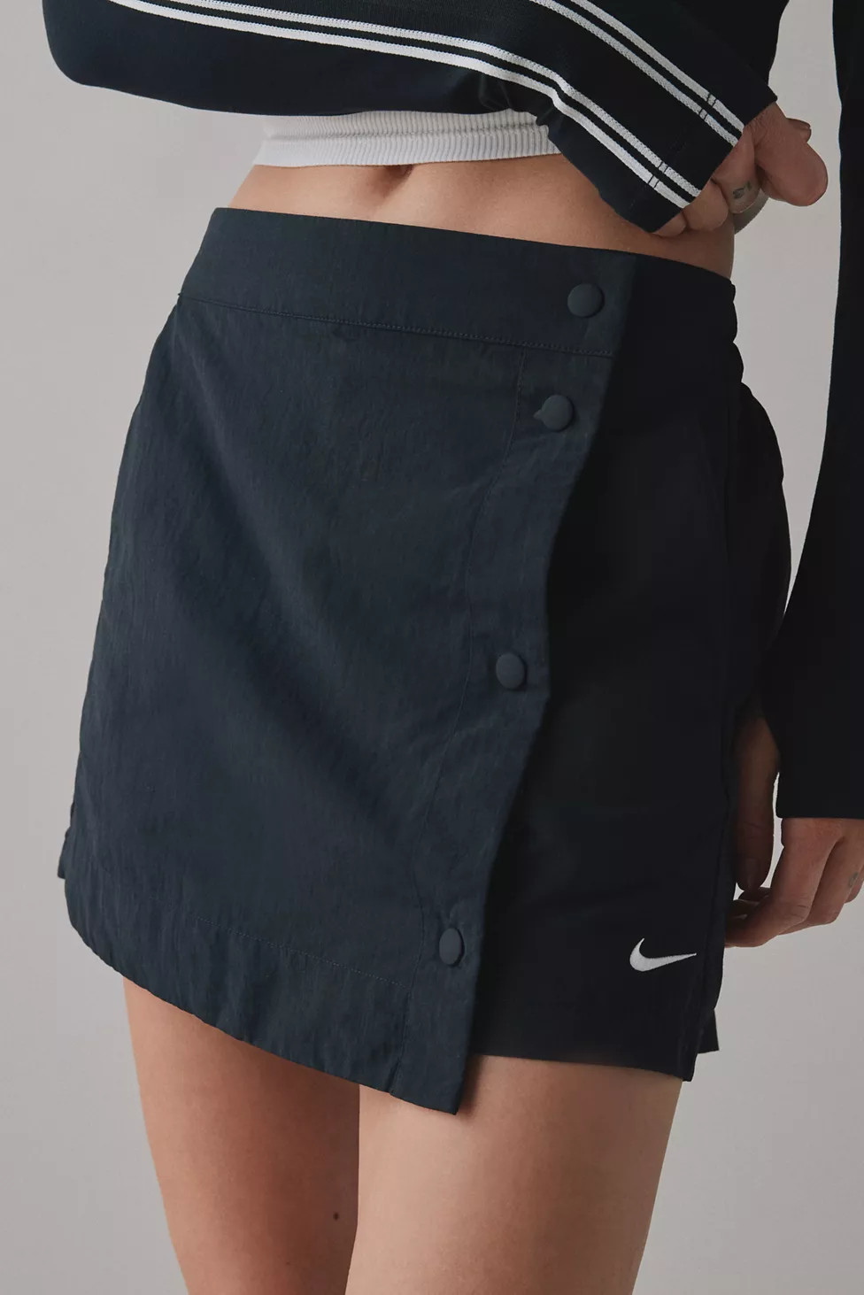 Nike Sportswear Essentials Woven Mid-Rise 3” Skort | Urban Outfitters (US and RoW)
