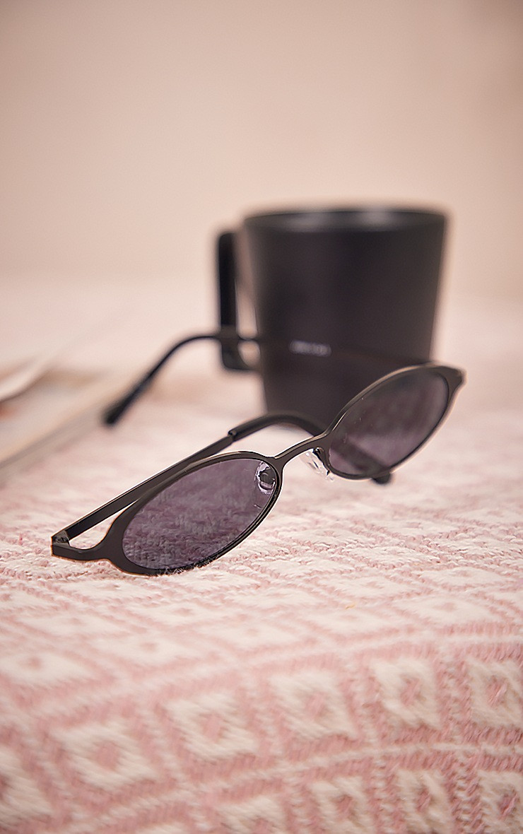 Black Metal Slim Oval Sunglasses | PrettyLittleThing US