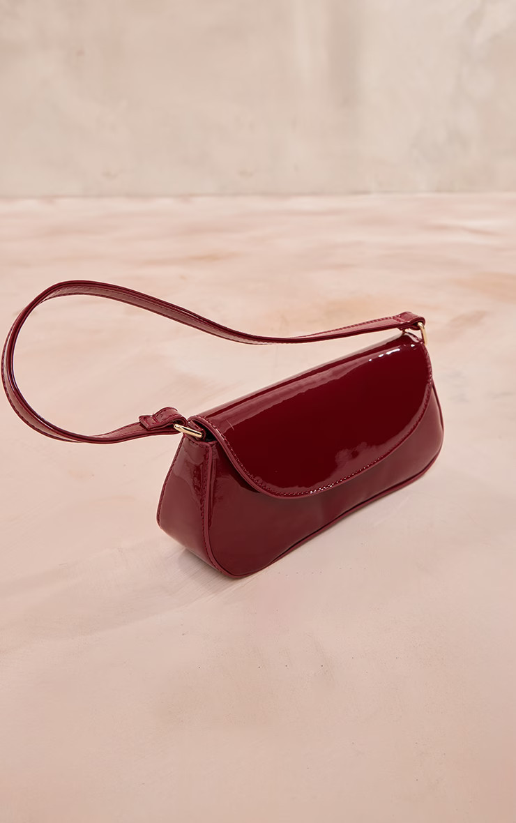 Burgundy Patent Slim Curved Shoulder Bag | PrettyLittleThing US