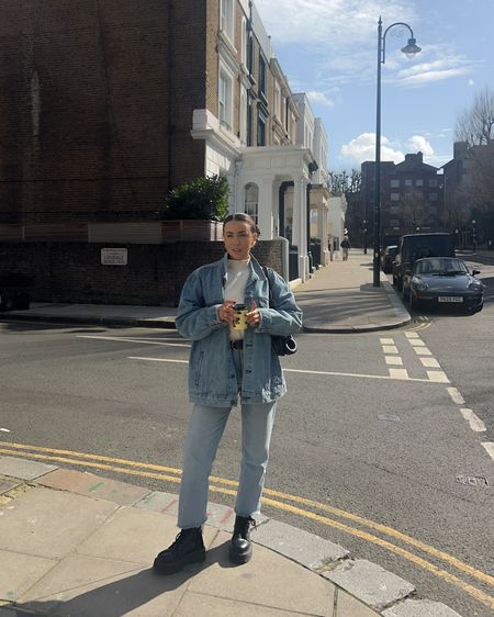 Double denim with dr marten Jadon boots and an oversized Levi’s trucker jacket styled with straight leg jeans and an oversized giant leopard scrunchie