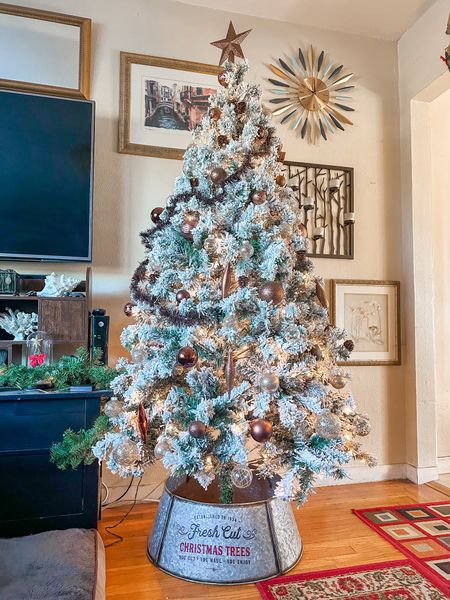 Flock Christmas tree with brown and clear ornaments





#LTKHoliday #LTKSeasonal #LTKhome