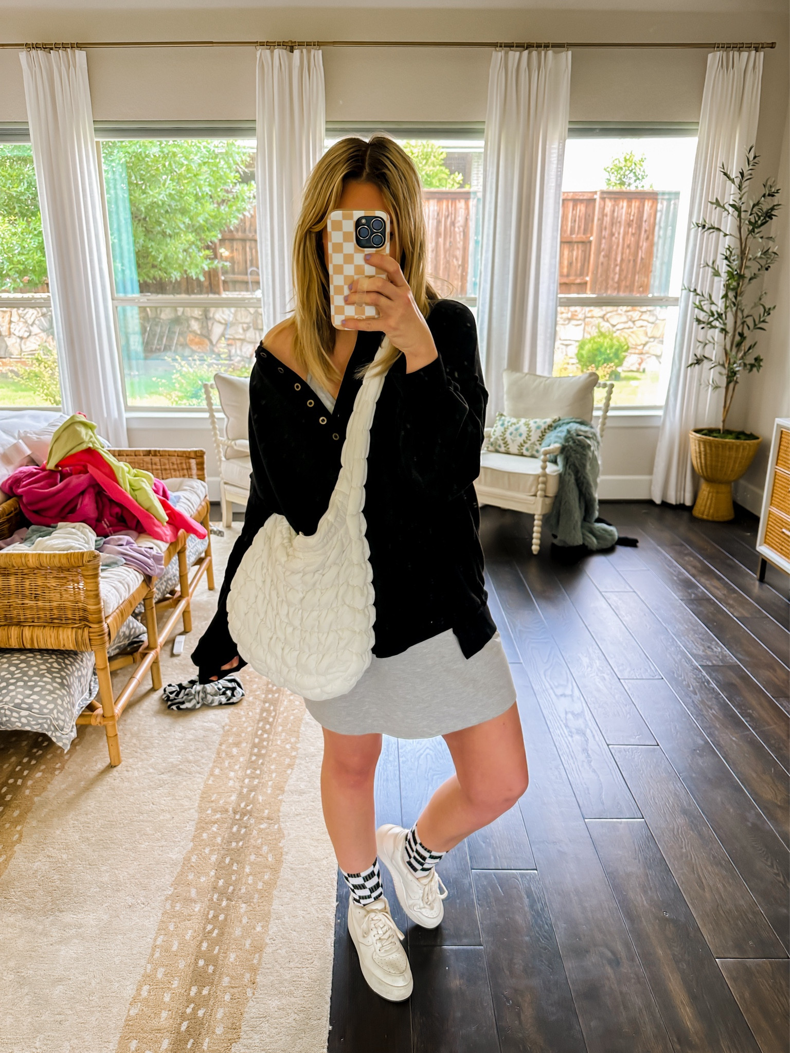 Romper dress, true size. Sweatshirt sized up to a large.