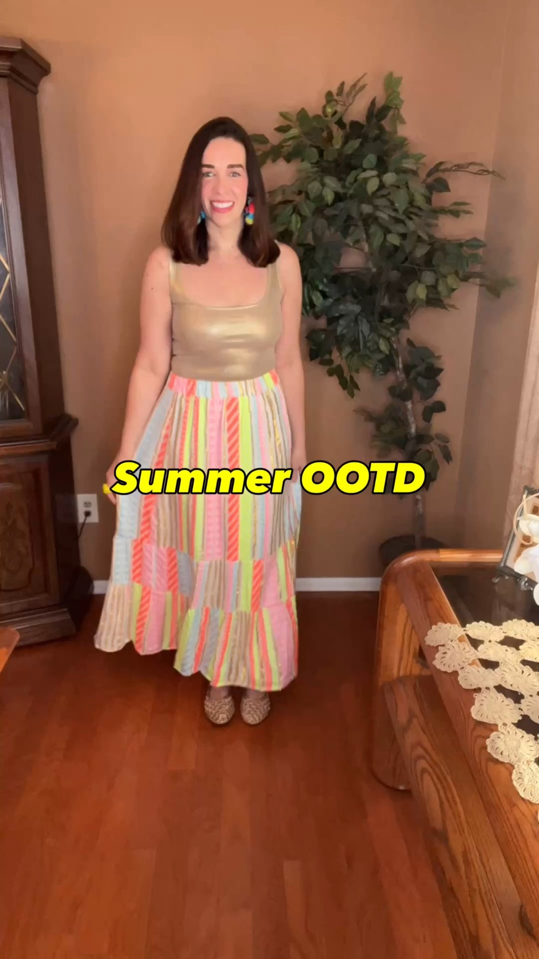 Gold metallic tank (s). Colorful striped maxi skirt (s). Gold weave ballet flats (9). #metallictank #goldtank #tanktop #skirt #maxiskirt #colorfulmaxiskirt #stripedskirt #goldflats #flats #balletflats

#LTKootd #LTKSeasonal