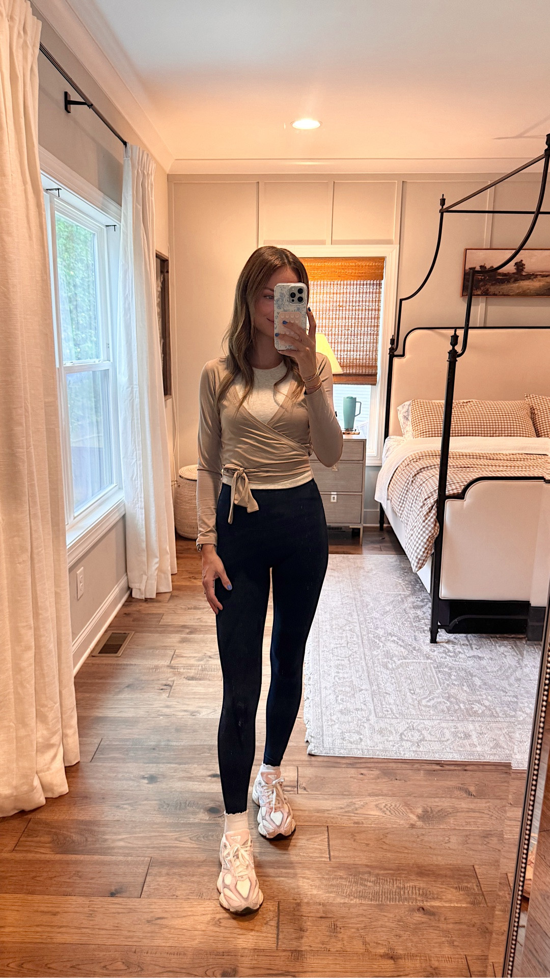 Wearing a size small in this wrap top I love wearing with my workout fits.