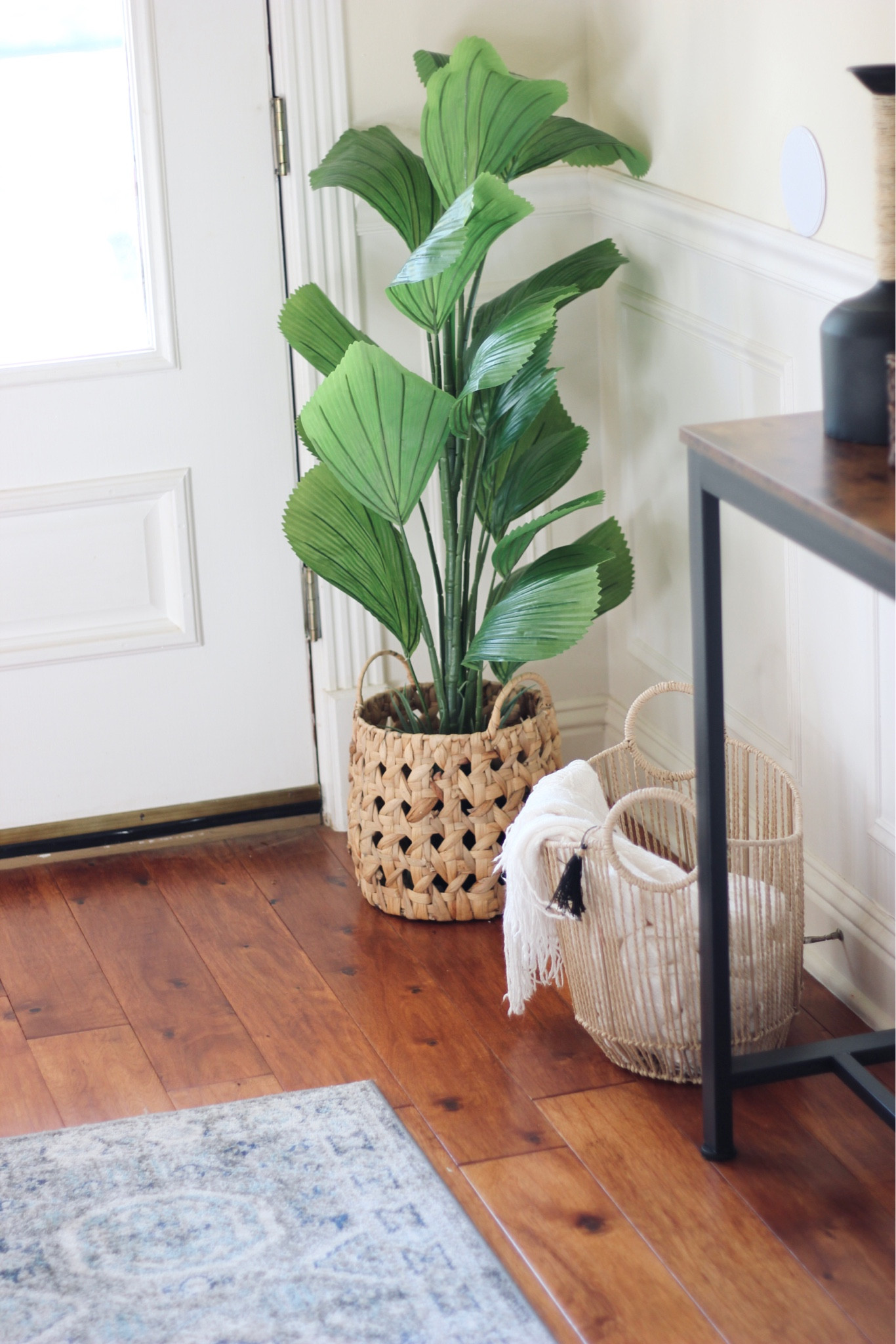 A corner in our entryway. 

Faux tree, faux plant, woven basket, basket with handles, round basket, entryway table, console table, throw blanket, entryway decor, home decor, Amazon finds, Target finds, threshold 

#LTKhome #LTKunder50 #LTKunder100