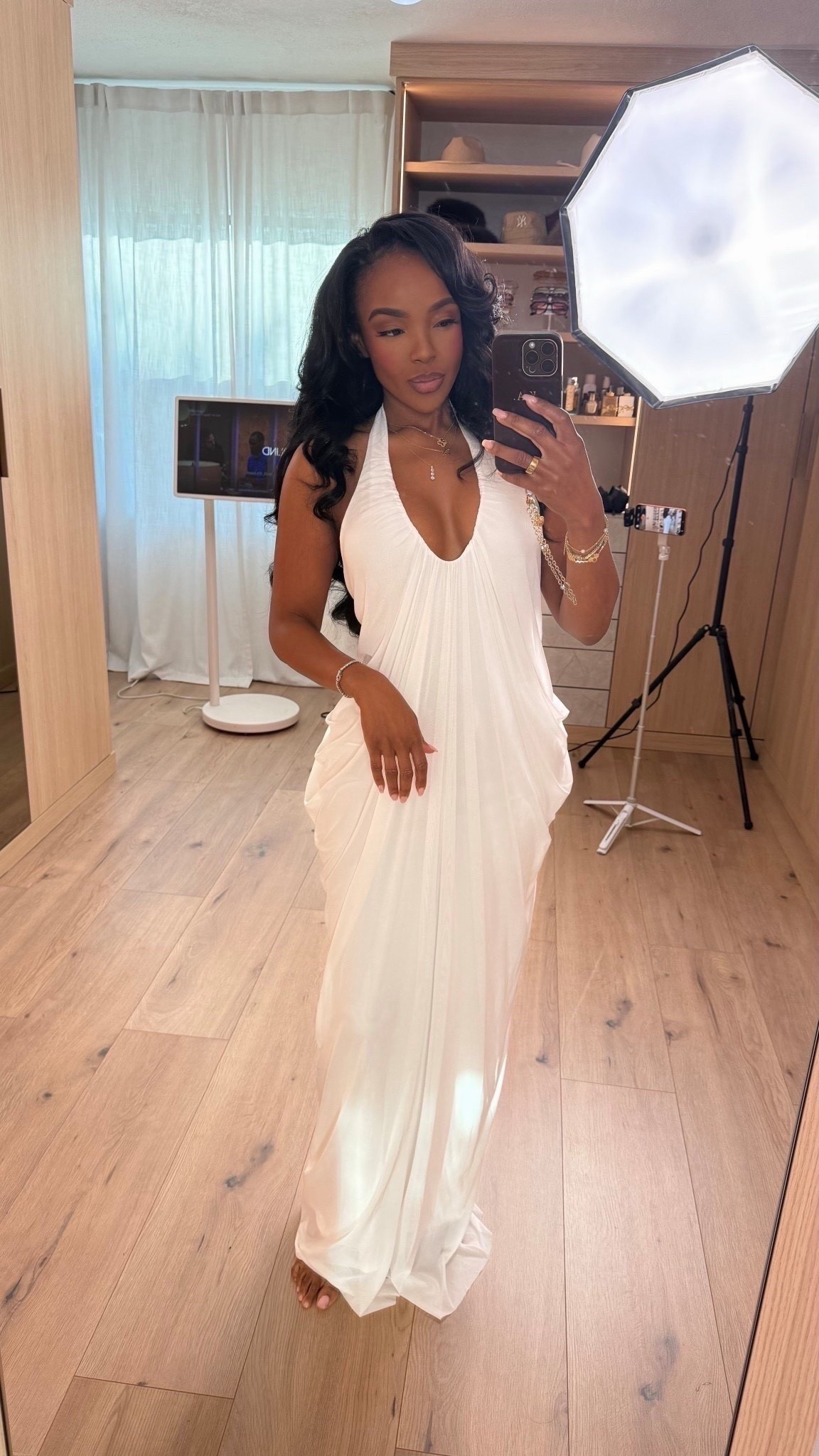 Hi Babes!

This white draped maxi dress is giving goddess energy in the MOST flattering way 🤍 The deep halter neckline, soft pleated fabric, and flowy silhouette make this feel so luxurious and high-end while still being lightweight and comfortable. I’m obsessed with how beautifully it moves and how the gathered detailing keeps shape without clinging too tightly.

This is one of those dresses that instantly makes you feel elegant the second you put it on. Minimal styling needed because the dress truly does all the work.

Where to wear this:
• Vacation dinners
• Beach weddings
• Bridal events
• Luxury resort nights
• Summer date nights
• Sunset dinners by the water

Undergarments: sticky bra or lifting cups with seamless nude shapewear shorts underneath if you want extra smoothing with the lightweight fabric.

Everything is linked below

xx Kira | IG: KirasFashionFinds

34D - 27 - 40 • Size Small or 4