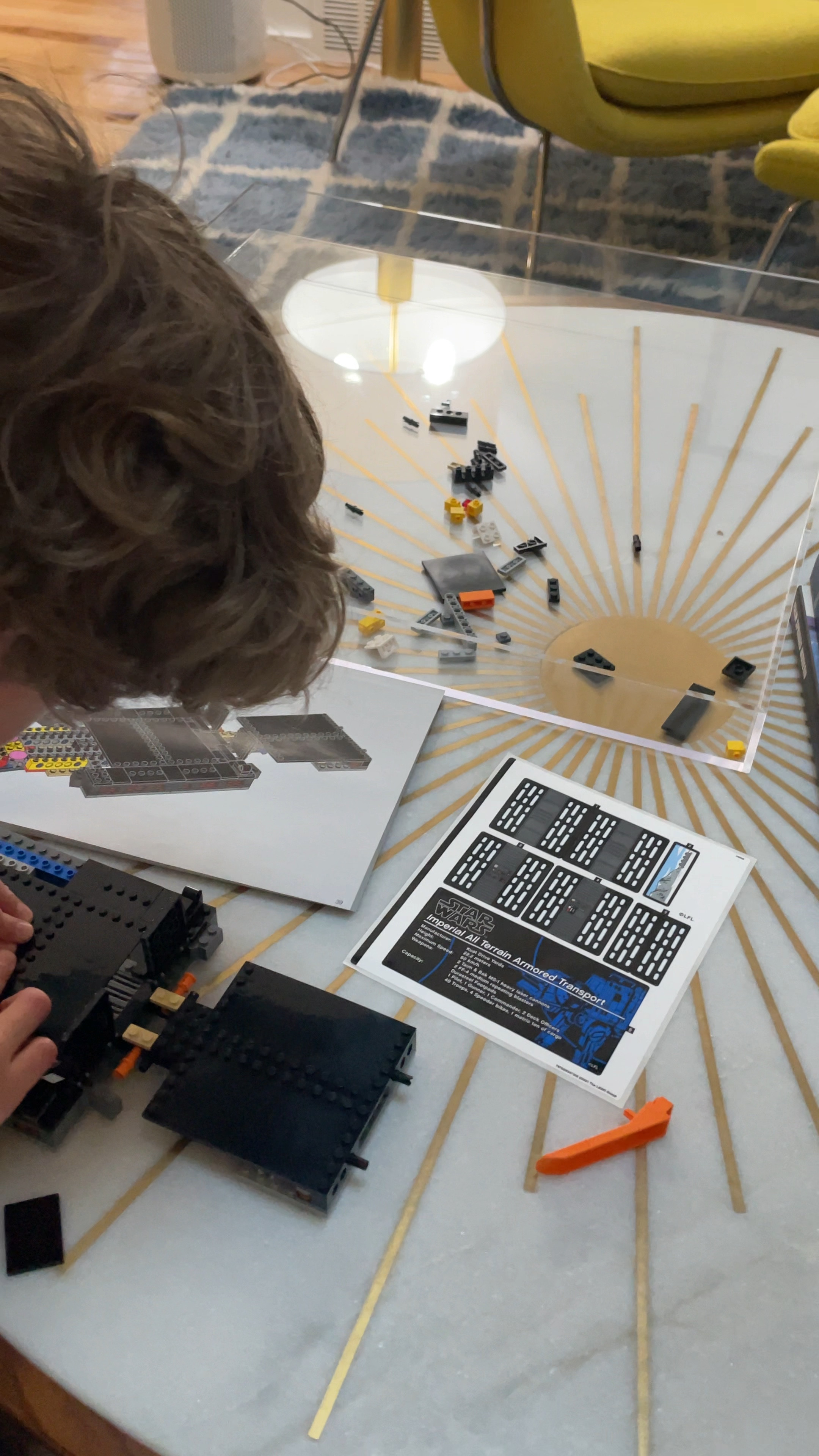 This giant acrylic tray is a game changer for kids who build large Lego sets. They can move the tray from room to room, never causing an issue with having to move 1000 pieces. 