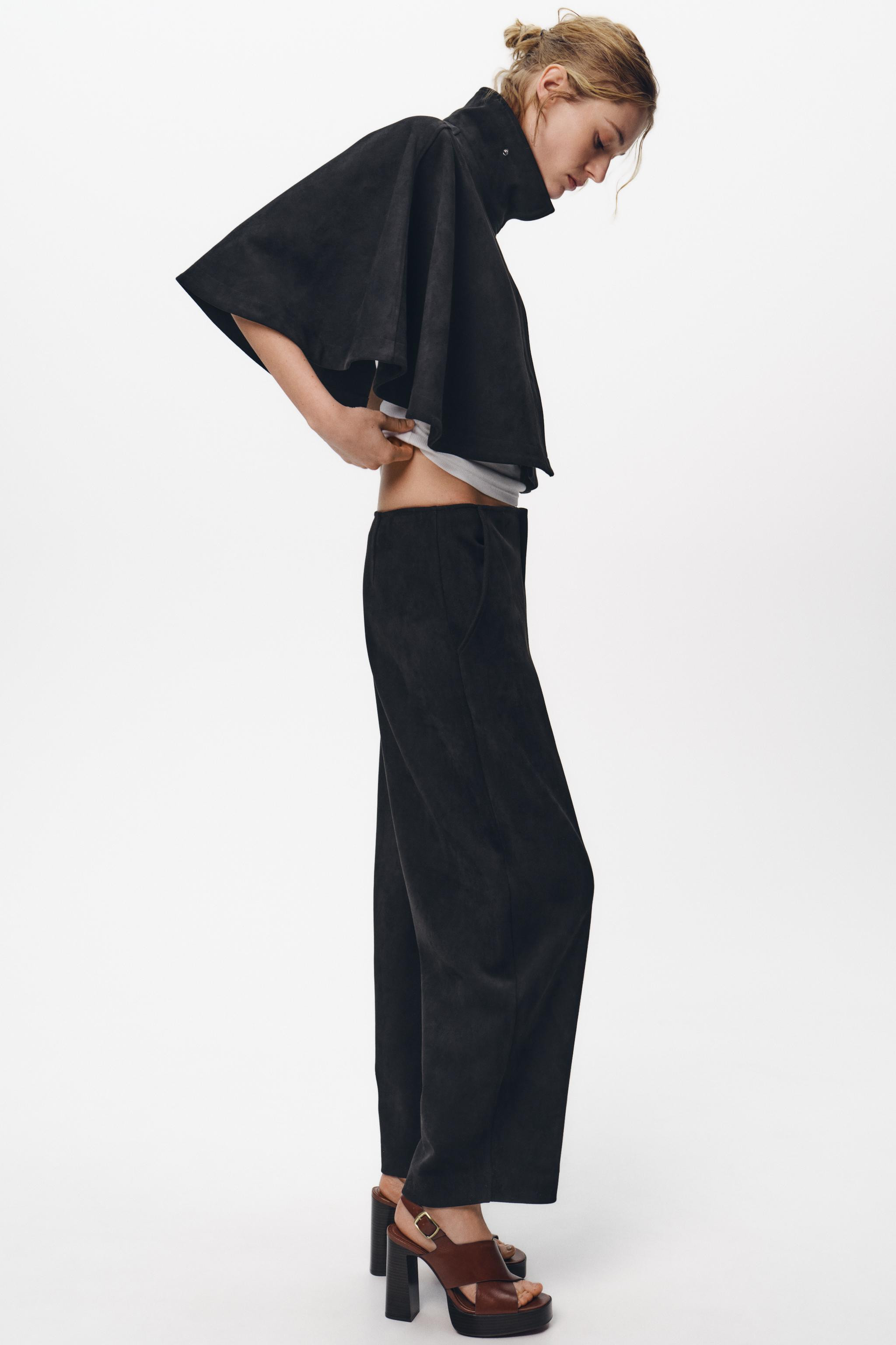 Mid-rise pants in faux suede fabric. Front pockets. Front zip, button, and metal hook closure. | Zara US