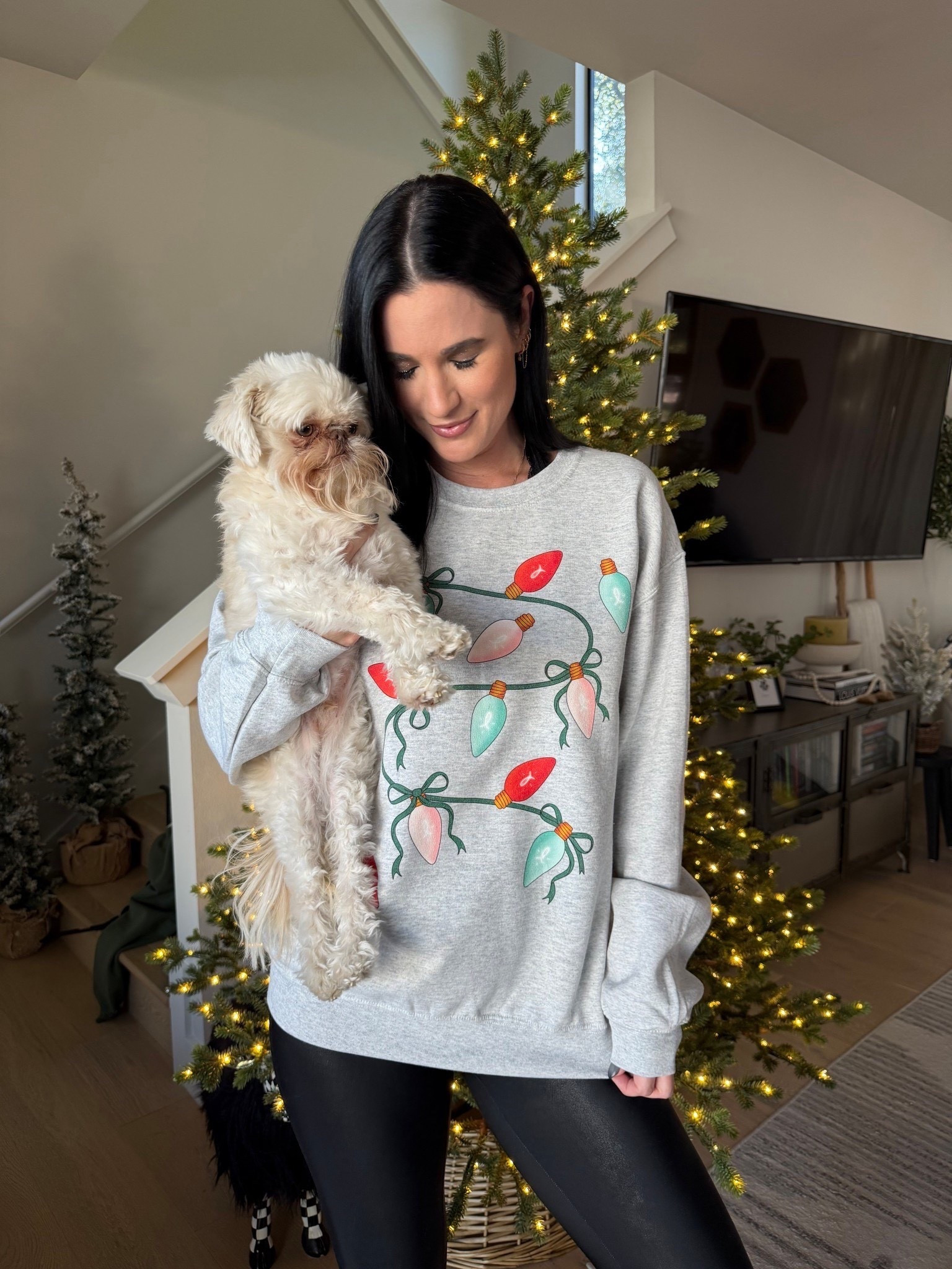 How cute is this Christmas lights sweatshirt? It is currently 10% off for Black Friday. I wear the size medium. My SPANX faux leather leggings are 50% off and only $49 from $98. I wear the size small.

#LTKFindsUnder50 #LTKHoliday #LTKGiftGuide