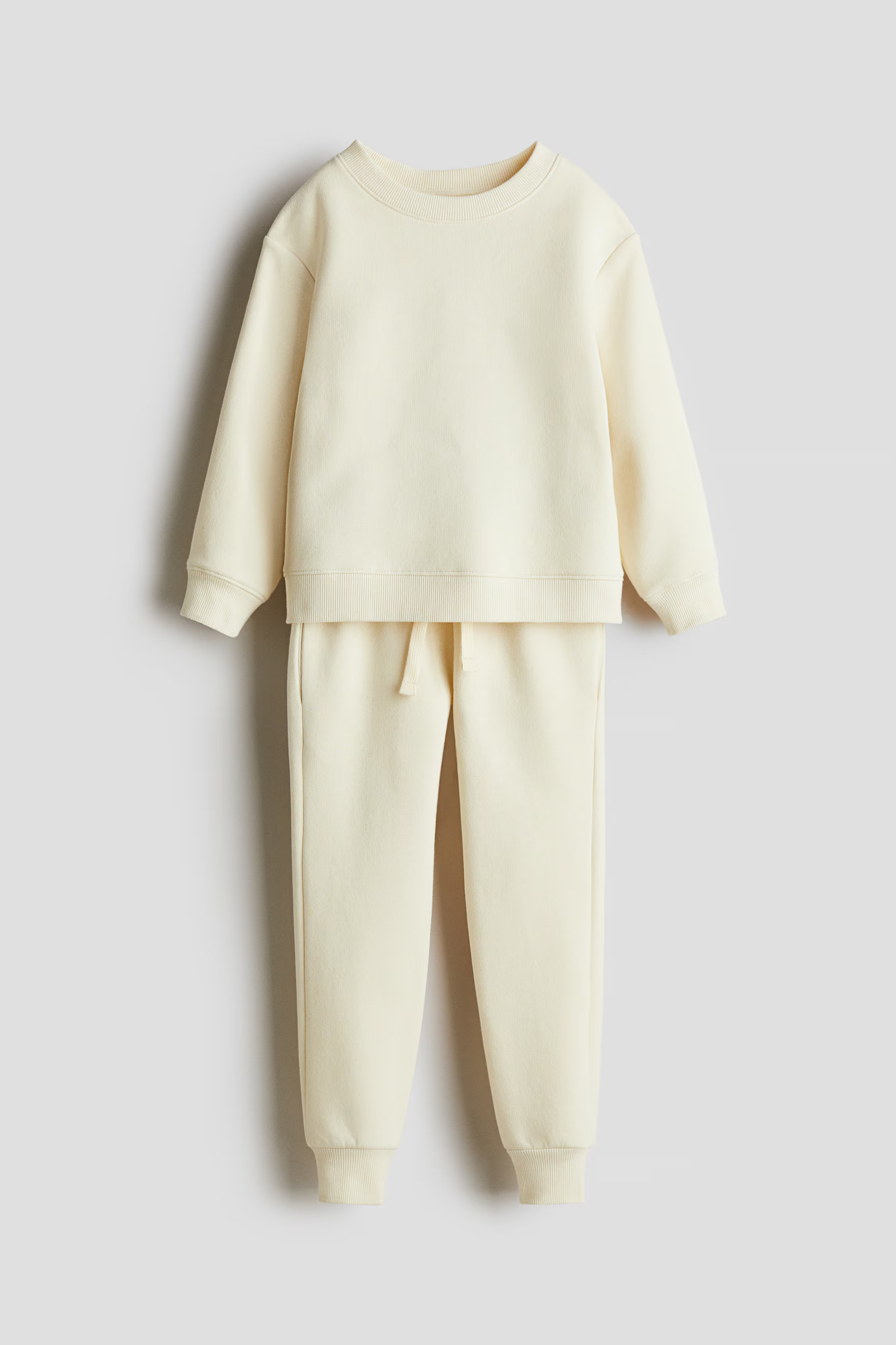 2-piece Sweatsuit - Light yellow - Kids | H&M US | H&M (US + CA)
