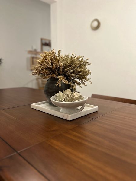 My decorative bowl is on SALE 🏷️. 

Kitchen table decor / walnut kitchen table / modern wall sconce / vintage black pot case / marble tray / 

#LTKstyletip #LTKhome #LTKsalealert