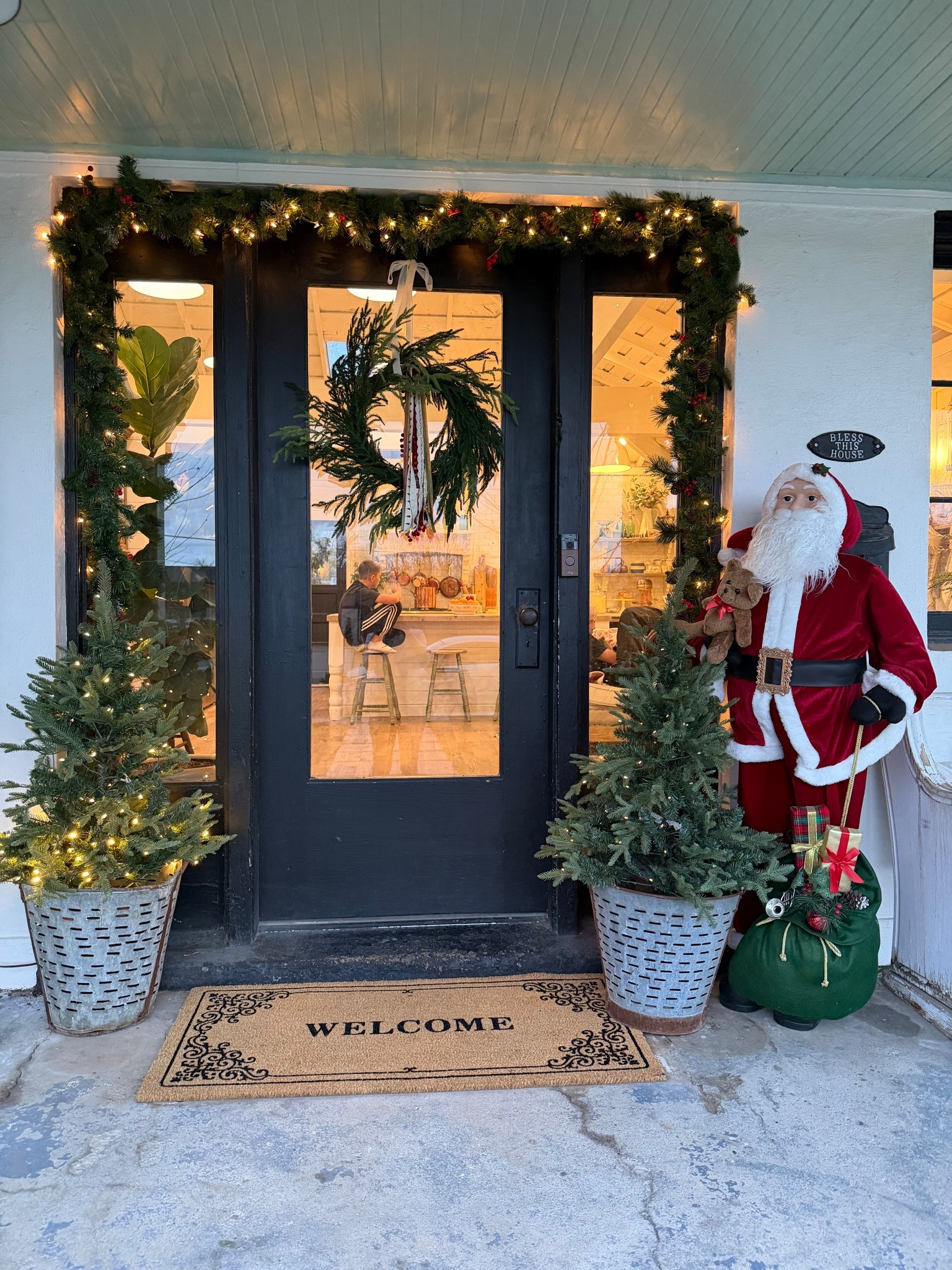 Christmas Front porch done. My wreath and garland are from Joannes, I’m so sad they closed last year. But the trees and Santa are from Home Depot  

#LTKSeasonal #LTKHoliday #LTKGiftGuide