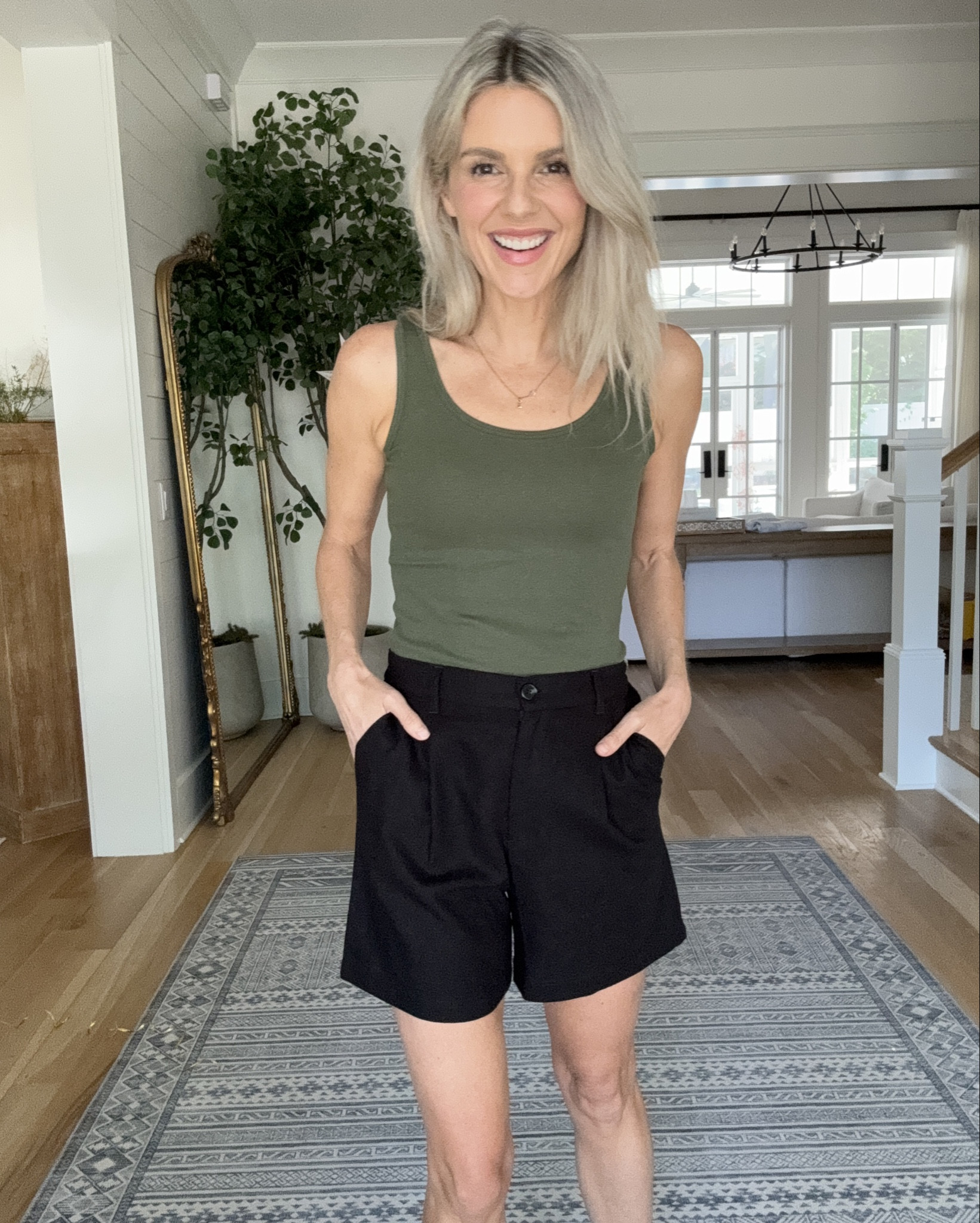 This tank top is less than five dollars and the most incredible basic tape chalk! It comes in 10 colors and I legit bought almost all of them. It’s just such a good deal and I’m always wearing these types of tanks either to lay other people pieces with or to just throw on in the summer when I don’t wanna think about what I’m wearing. I’m wearing my normal size and it’s fitted and beautiful. If you want a little looser, I would size up one.

And then I feel like it’s always hard to find shorts that have a long hemline, but are also high waisted. The reason I want a high waist with a long headline as I feel like they balance each other out. So these are great shorts for anybody who doesn’t like short shorts! They also have a stretchy ways to fit lots of different waist sizes and are true to size. 

#LTKFindsUnder50