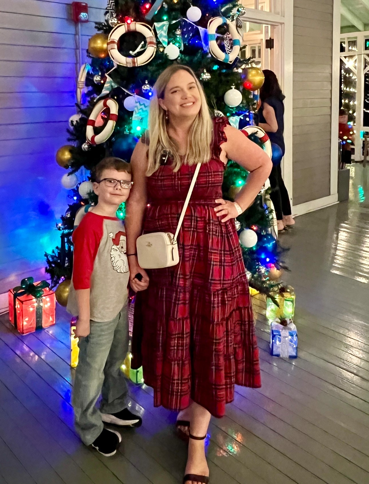 Christmas tree shopping. Christmas family photos. Holiday boy outfit. Plaid red dress for holidays. Midsize mom. Red dress. 

#LTKHoliday #LTKKids #LTKFindsUnder100