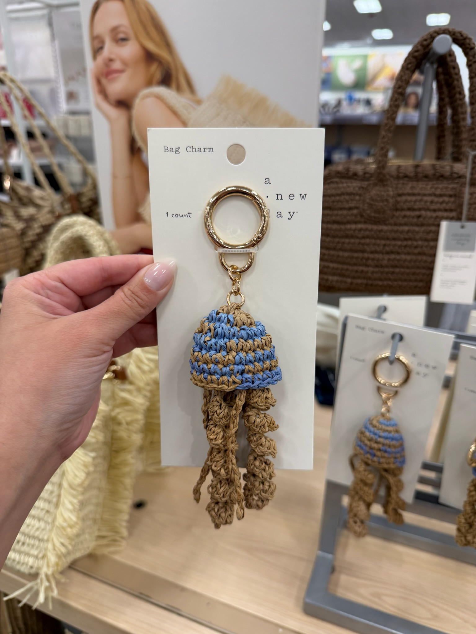 Okay this little jellyfish bag charm is way too cute. It feels like something you'd find in a little beach boutique on vacation, and I love the blue and natural woven details. 

wedding guest dress summer, fathers day gift guide, summer outfits, summer dresses, country concert outfits, fathers day gifts, date night outfits, travel outfits, concert outfits, business casual workwear, bag charm, beach accessories, summer accessories, coastal style, vacation style, target finds, cute accessories 

 #LTKootd #LTKSeasonal