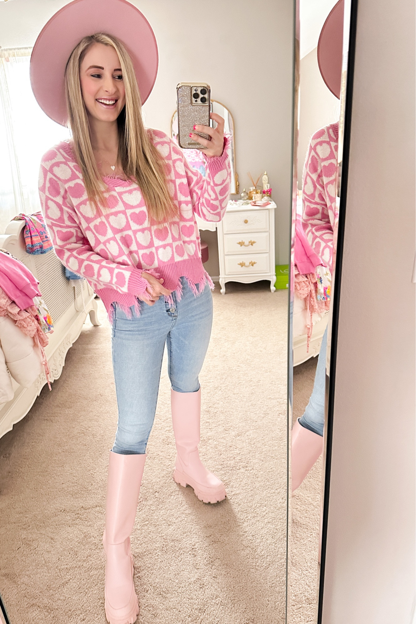OOTD. Outfit of the day. Pink and white heart sweater, pink hat from lack of color, Abercrombie and Fitch, skinny jeans, pink, knee-high combat boots by Sam Edelman from Amazon. Diamond heart necklace. Valentines outfit. Valentine's Day. Valentine's Day. Pink outfit. 

#LTKshoecrush #LTKSeasonal #LTKstyletip