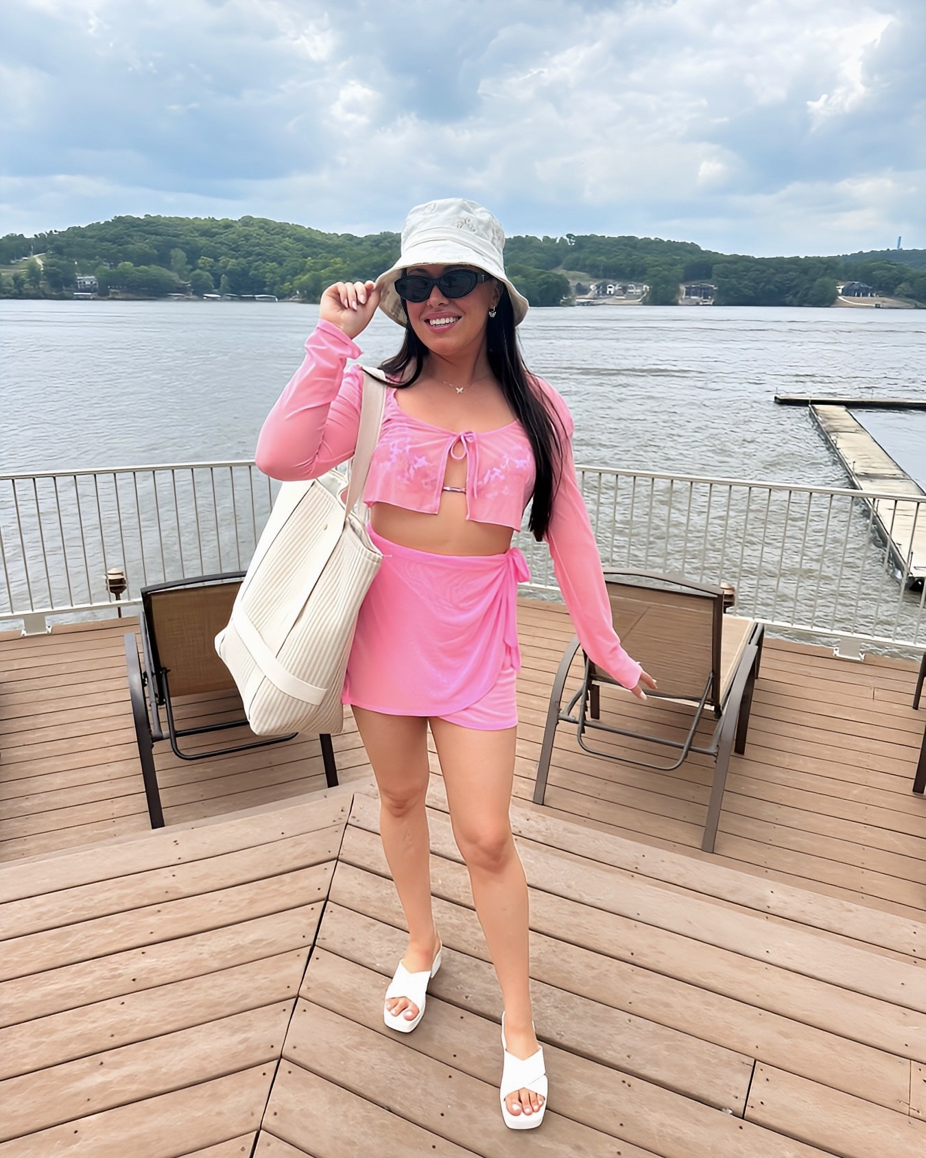 This Y2K swim look is perfect for pool parties or the beach! This mesh swimsuit coverup set from Target is only $18 each for the top and wrap skirt! 

I'm obsessed with butterflies so of course I had to pair it with a butterfly bucket hat from American Eagle - which is on sale right now! 

Jeffrey Campbell jelly sandals in white... and of course Kendra Scott butterfly earrings and necklace!! I love rocking anything and everything butterfly around this time of year because it's the Spring/ Summer vibe that works year after year! These pieces are so subtle so I don't feel like the butterflies are too loud! 🦋

Last but not least, my favorite sunless tanner... Isle of Paradise! I get mine in the darker shade because it's purple hue counteracts any orange shades! It stays on for days and also protects me from the sun and evens skin tone. This is one of my must haves for summer 🌞 

#LTKFindsUnder50 #LTKSwim #LTKStyleTip