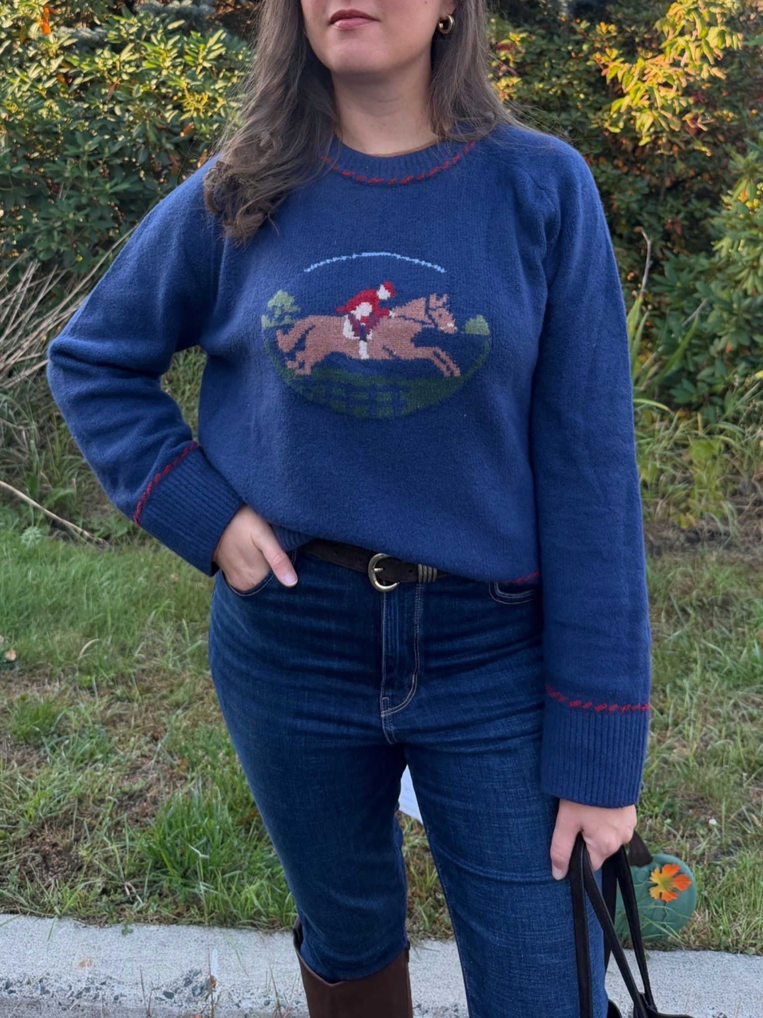The cutest equestrian sweater!

Size medium