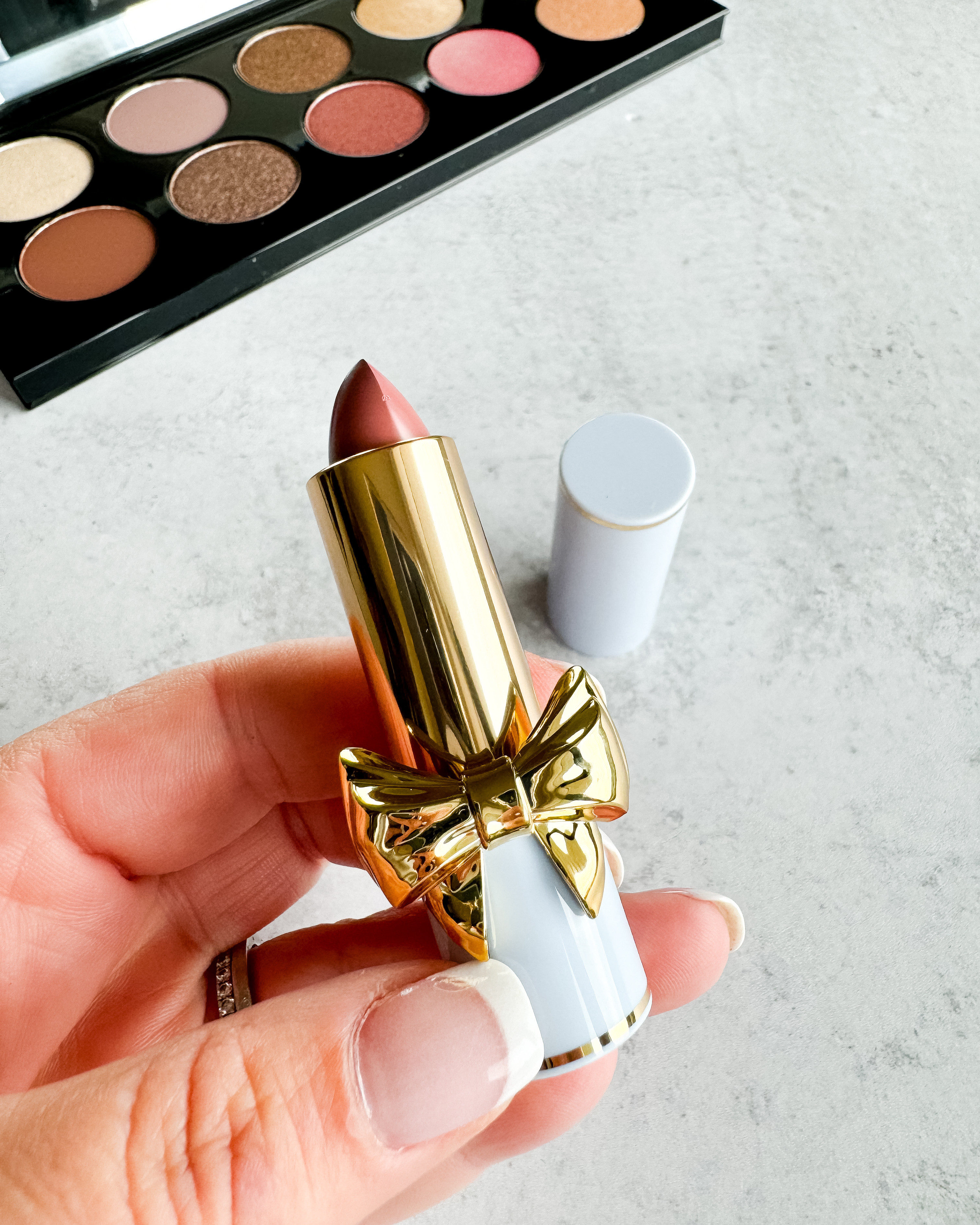 I got this Pat McGrath lipstick earlier this year because I was a sucker for the bow😝 I have been loving this nude pink shade for everyday and event looks with a bold eye! 

#LTKBeauty #LTKSeasonal #LTKStyleTip