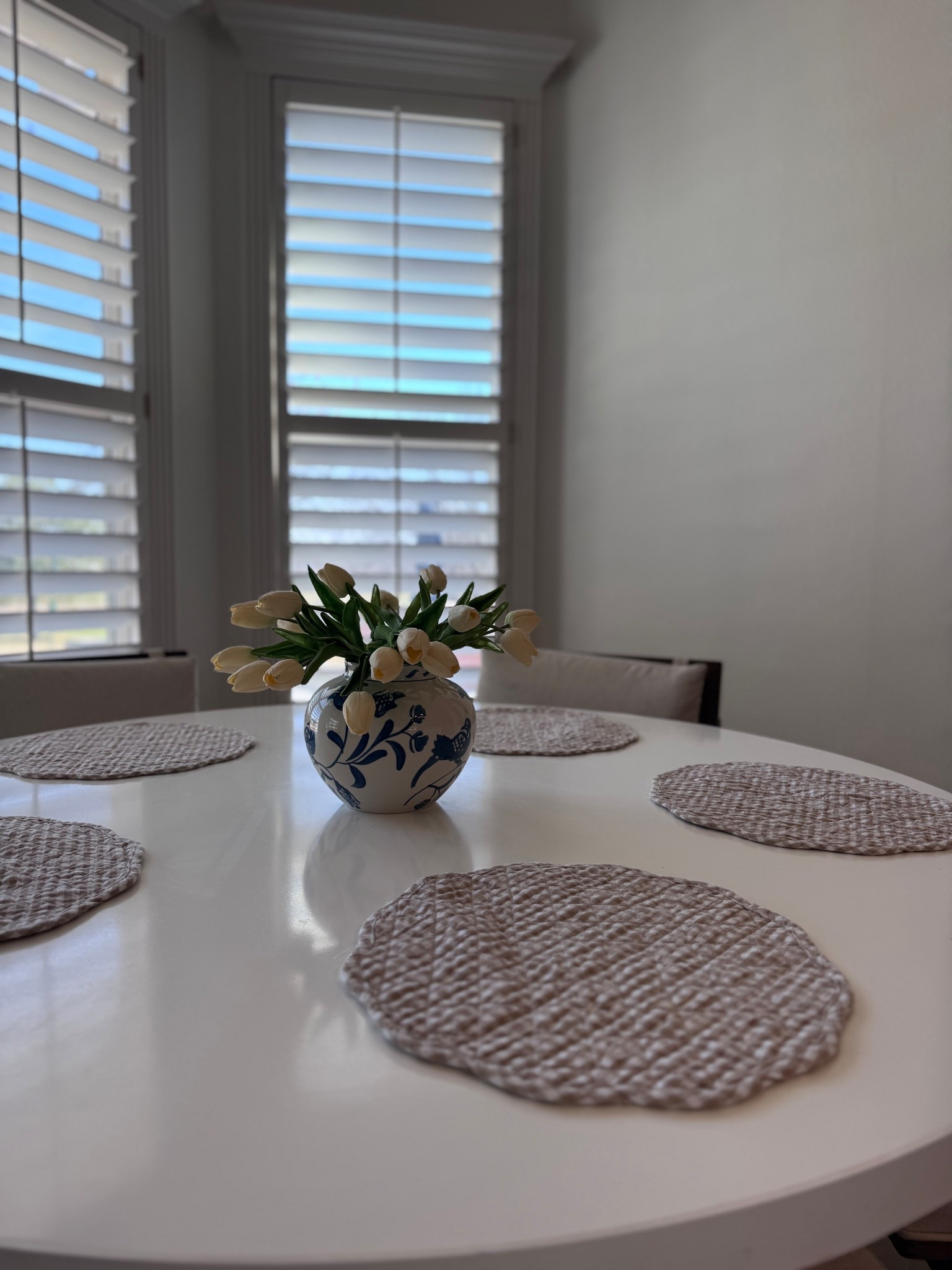Round dining table // blue vase // faux tulips from Amazon 

#LTKHome